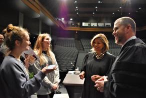 Justices talking to students after an Appeals on Wheels event