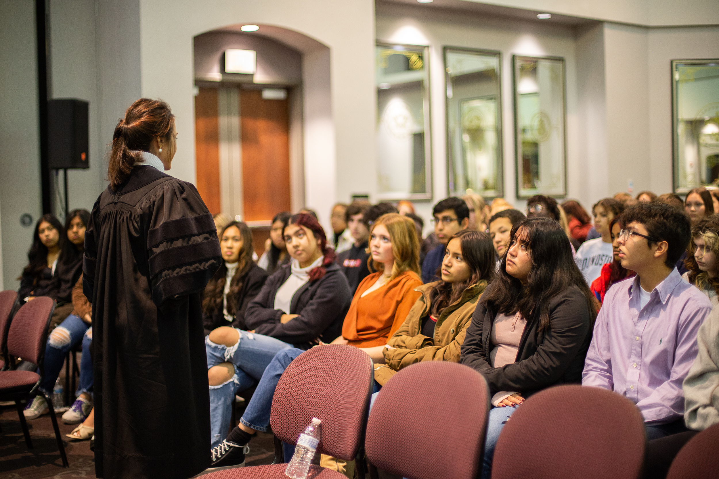 Justices talking to students after an Appeals on Wheels event